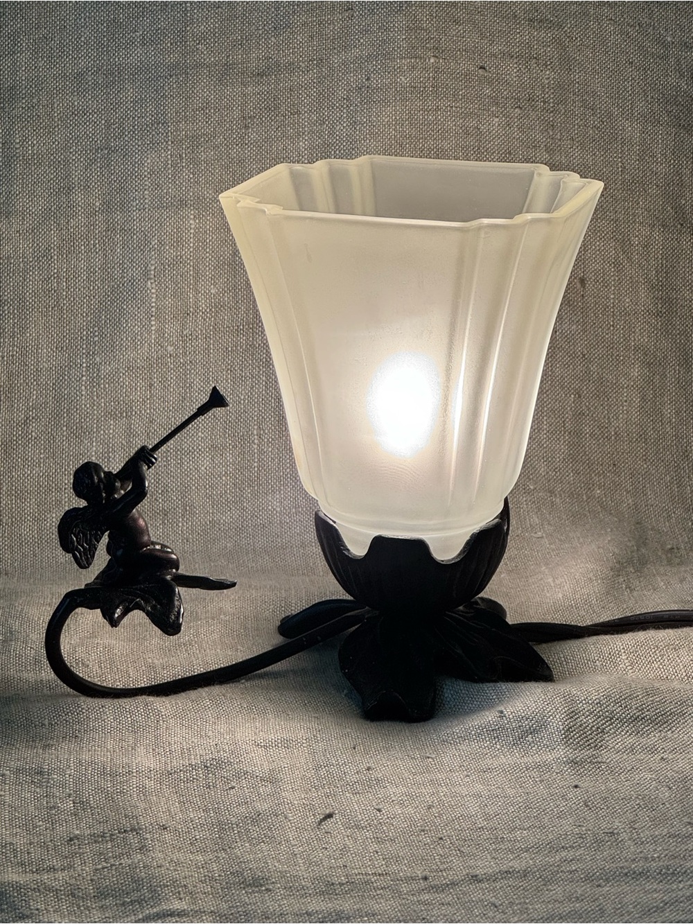Vintage style cast metal cherub lamp
